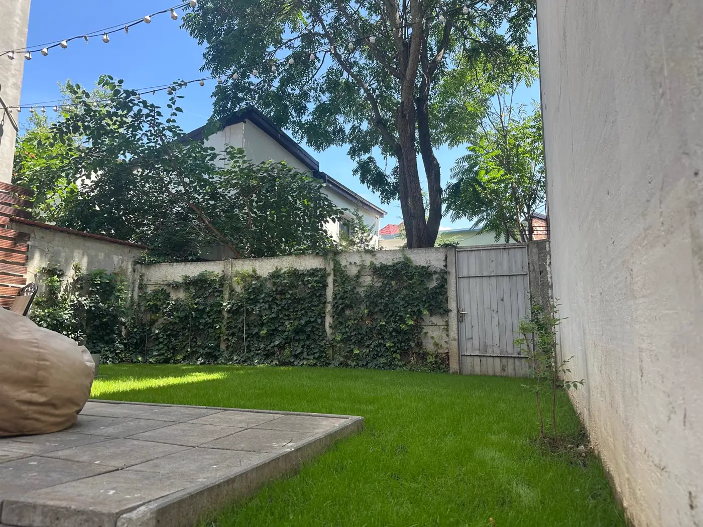 Andrei's garden from another angle – greenery and the open-air working corner.